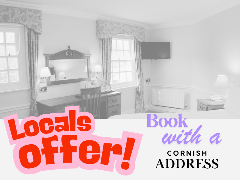 LOCALS-OFFER A hotel room with a desk, chair, TV, and bed, overlaid with text: “Locals Offer! Book with a Cornish address.”.